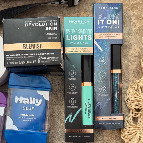 Black Crossbody Bag with Butterfly Accent and beauty items - Picture 2 of 4